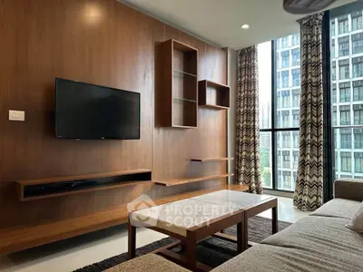 Modern living room with wooden accents and large windows offering city views.