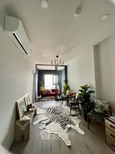 Stylish living room with zebra rug and modern decor in a bright apartment
