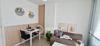 Chic modern living room with cozy decor and dining area