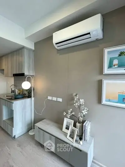 Modern living room with air conditioning and stylish decor in a contemporary apartment.