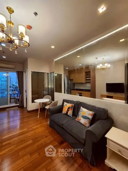 Stylish living room with elegant lighting and cozy seating in modern apartment