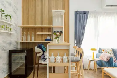 Stylish modern living room with bar area and cozy seating