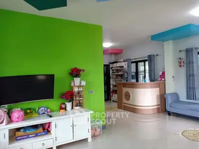 Vibrant living room with green accent wall and modern decor