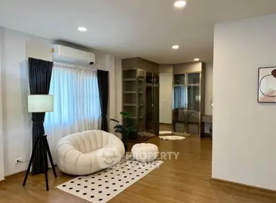 Spacious modern living room with elegant decor and cozy seating area