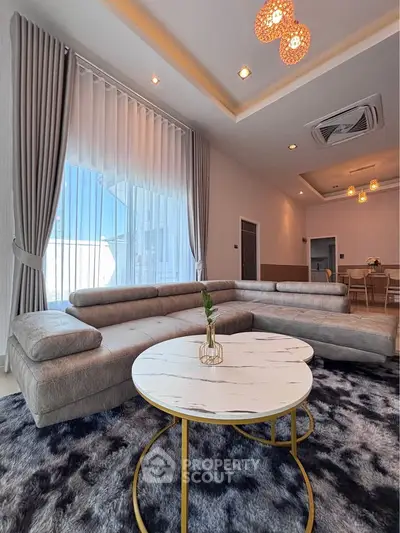 Luxurious modern living room with stylish furniture and elegant decor