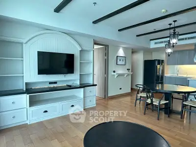 Spacious modern living room with open kitchen and stylish decor