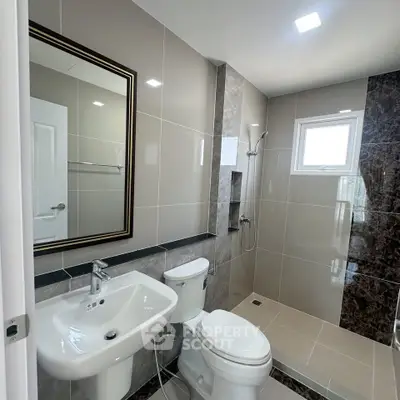 Modern bathroom with sleek fixtures and elegant tile design