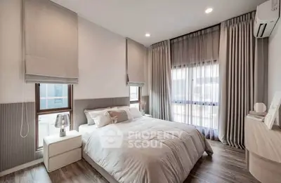 Modern bedroom with elegant decor and natural light