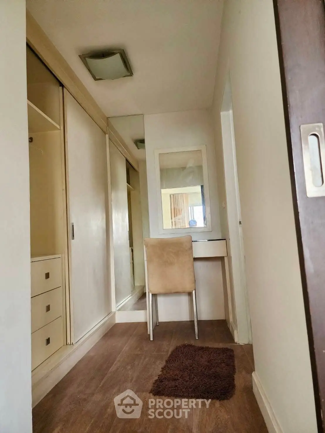 Cozy study nook with desk and chair in modern apartment