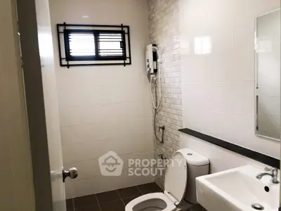 Modern bathroom with sleek fixtures and natural light