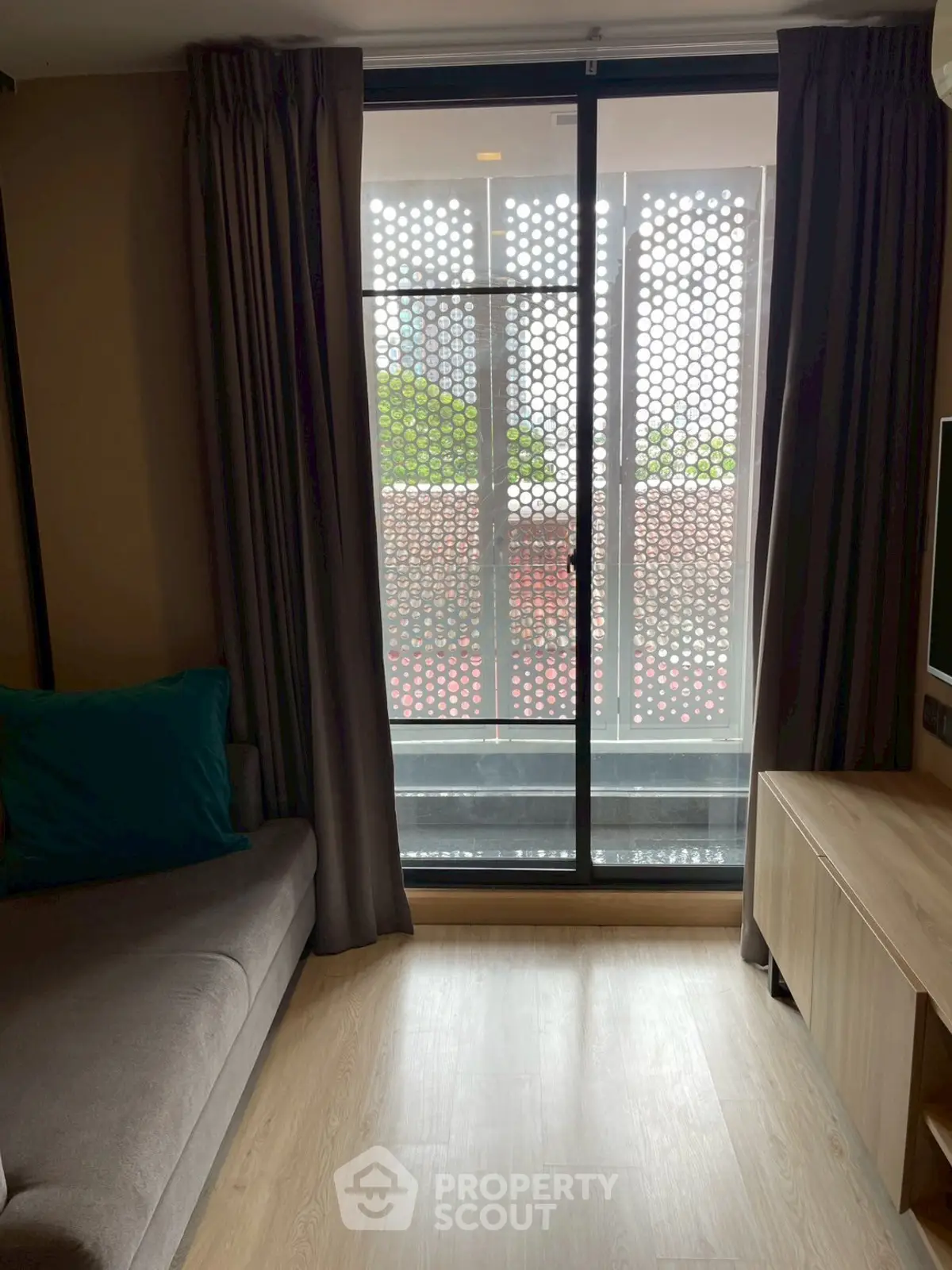 Modern living room with balcony view and stylish decor