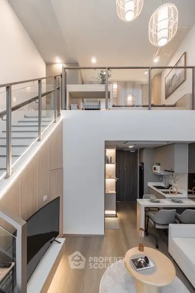 Modern loft-style living room with open kitchen and stylish decor