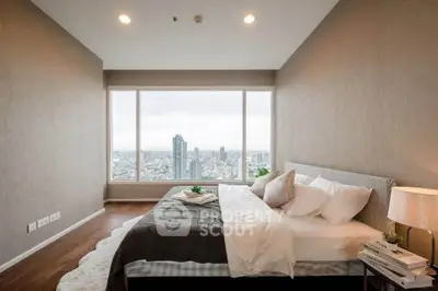 Luxurious bedroom with stunning city view and elegant decor