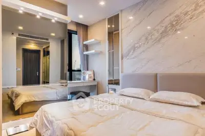 Luxurious modern bedroom with elegant marble wall and ambient lighting