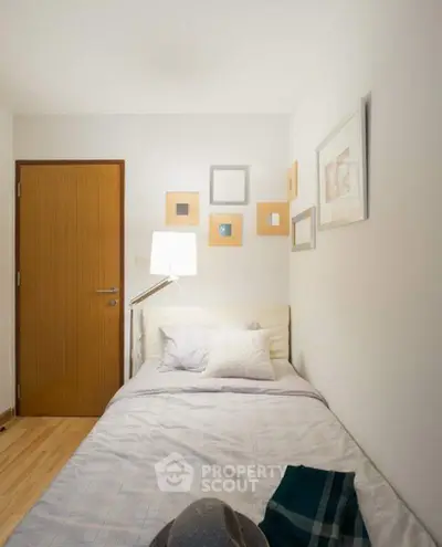 Cozy minimalist bedroom with modern decor and soft lighting