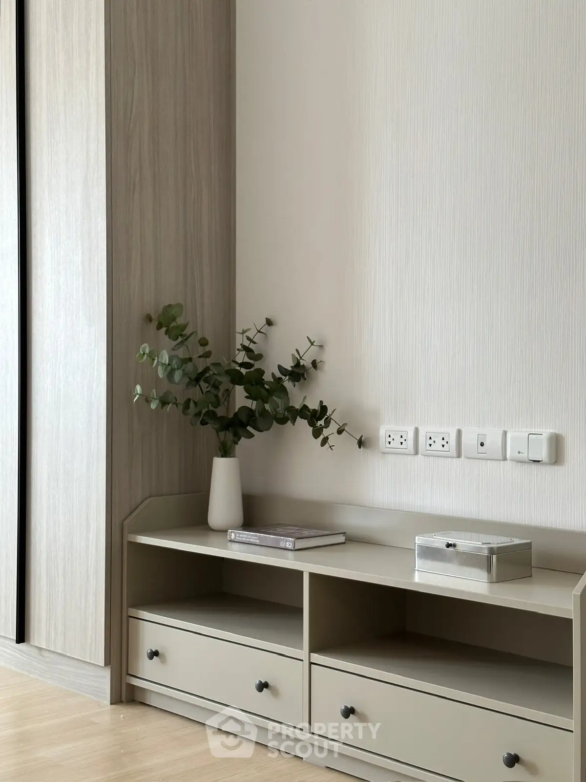 Modern minimalist interior with sleek storage and elegant decor