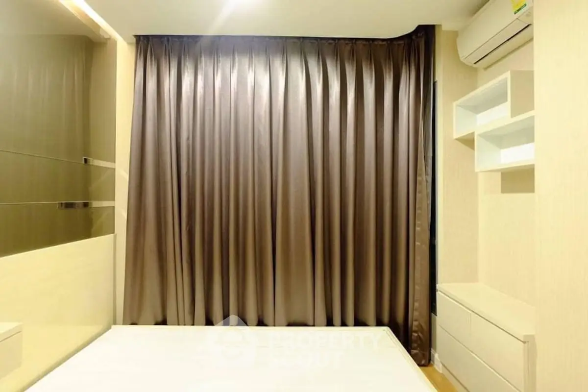 Modern bedroom with sleek design and air conditioning unit