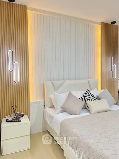 Modern bedroom with stylish lighting and cozy decor