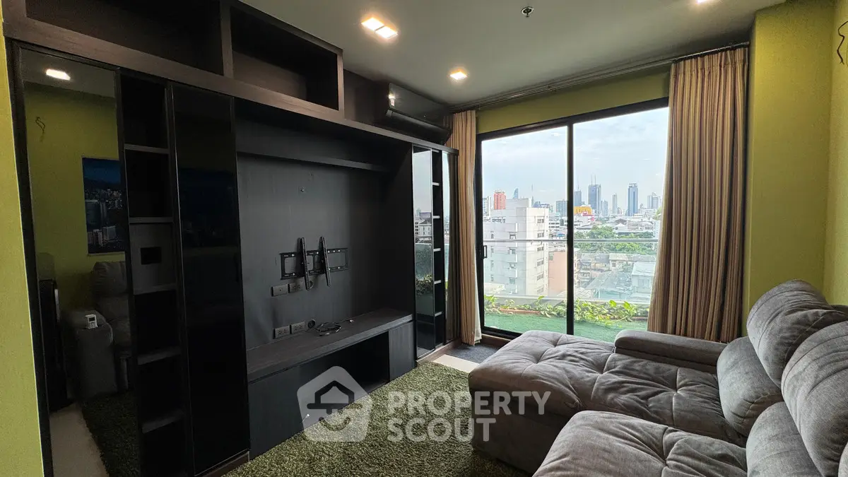Modern living room with city view and cozy sectional sofa