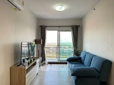 Modern living room with blue sofa and balcony view