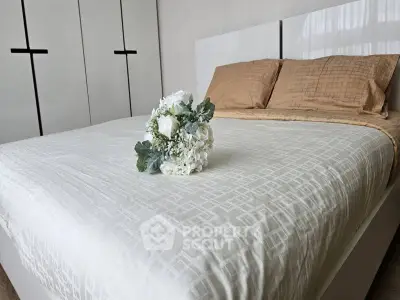 Elegant bedroom with stylish decor and cozy bedding