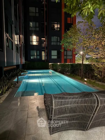 Luxurious apartment pool area with modern design and ambient lighting