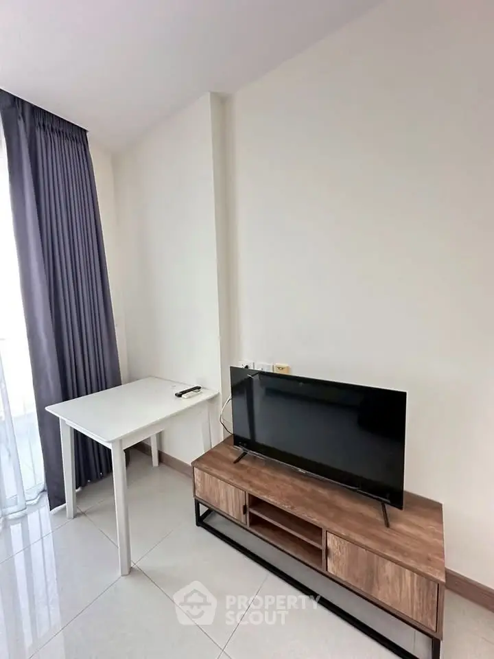 Modern living room with sleek TV stand and minimalist decor