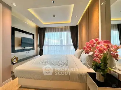 Luxurious bedroom with modern decor and large window view