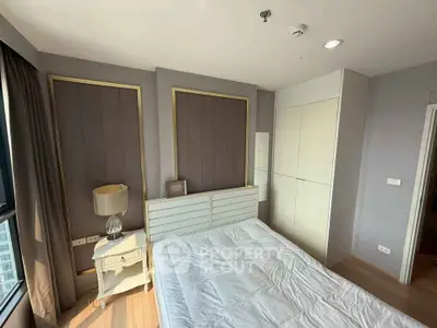 Modern bedroom with stylish decor and ample natural light
