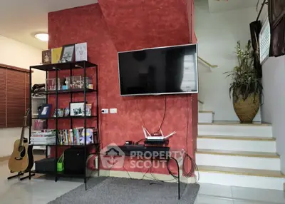 Stylish living room with modern decor and wall-mounted TV