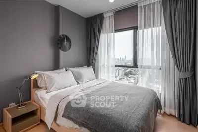 Modern bedroom with city view and stylish decor