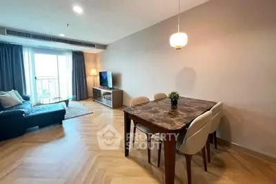 Spacious modern living room with elegant dining area and natural light