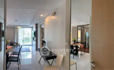 Spacious modern living room with open layout and elegant dining area