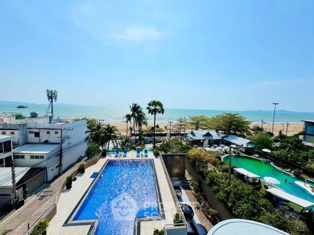 Stunning beachfront property with pool and ocean view, perfect for luxury living.