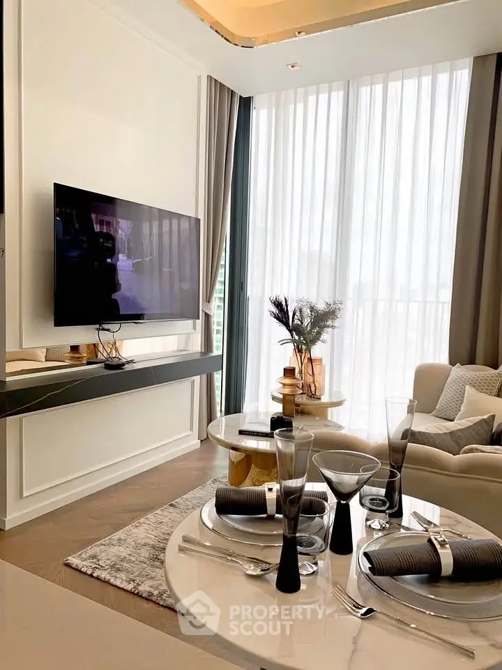 Luxurious modern living room with elegant decor and large windows offering natural light.