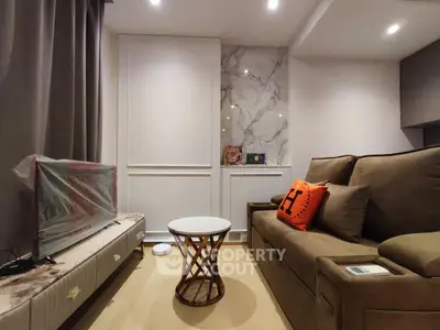 Cozy living room with modern decor and comfortable seating