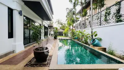 Luxurious villa with private pool and lush garden, perfect for serene living.