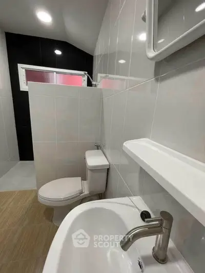 Modern bathroom with sleek fixtures and stylish tile design