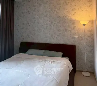 Cozy bedroom with modern decor and soft lighting