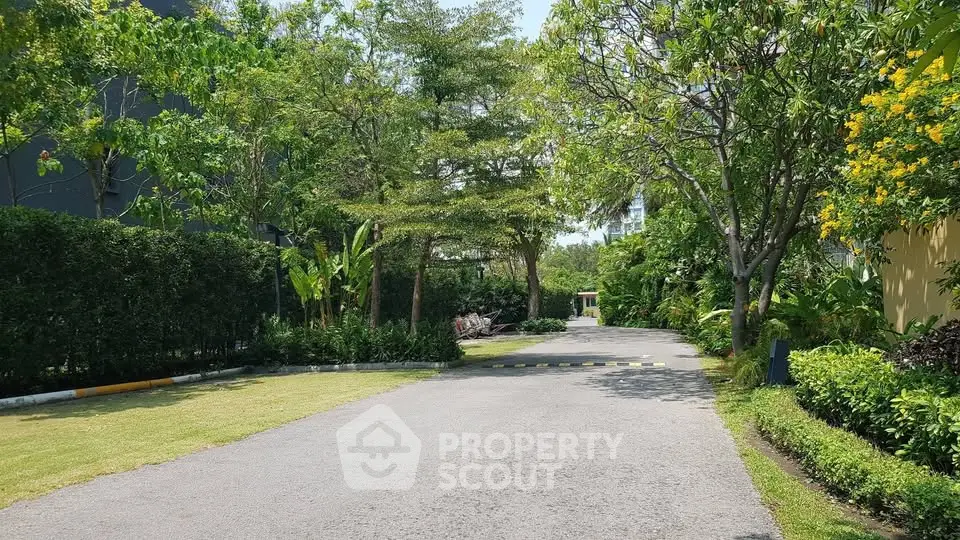 Lush green garden pathway in a serene residential community