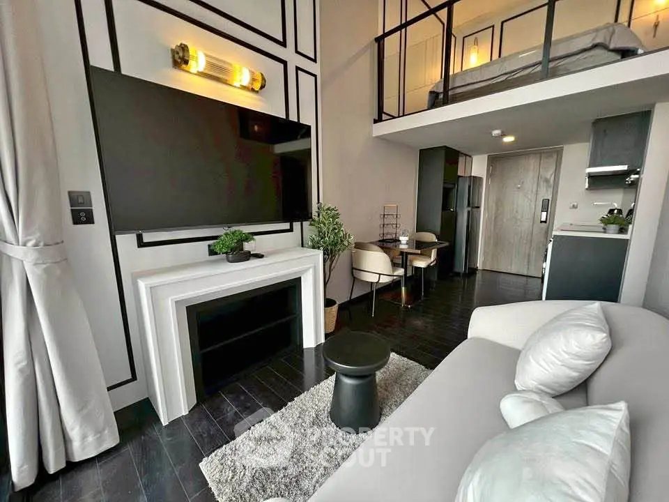 Modern loft apartment with stylish living area and mezzanine bedroom