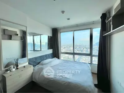 Modern bedroom with panoramic city view and stylish decor