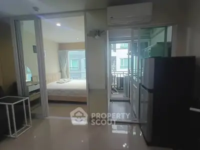 Modern apartment interior with bedroom and balcony view