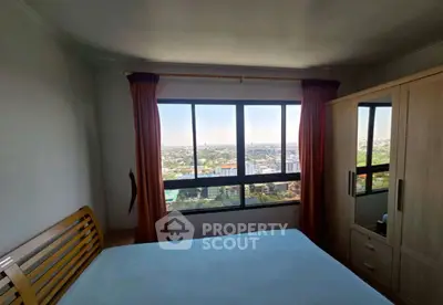 Cozy bedroom with panoramic city view and wooden furniture