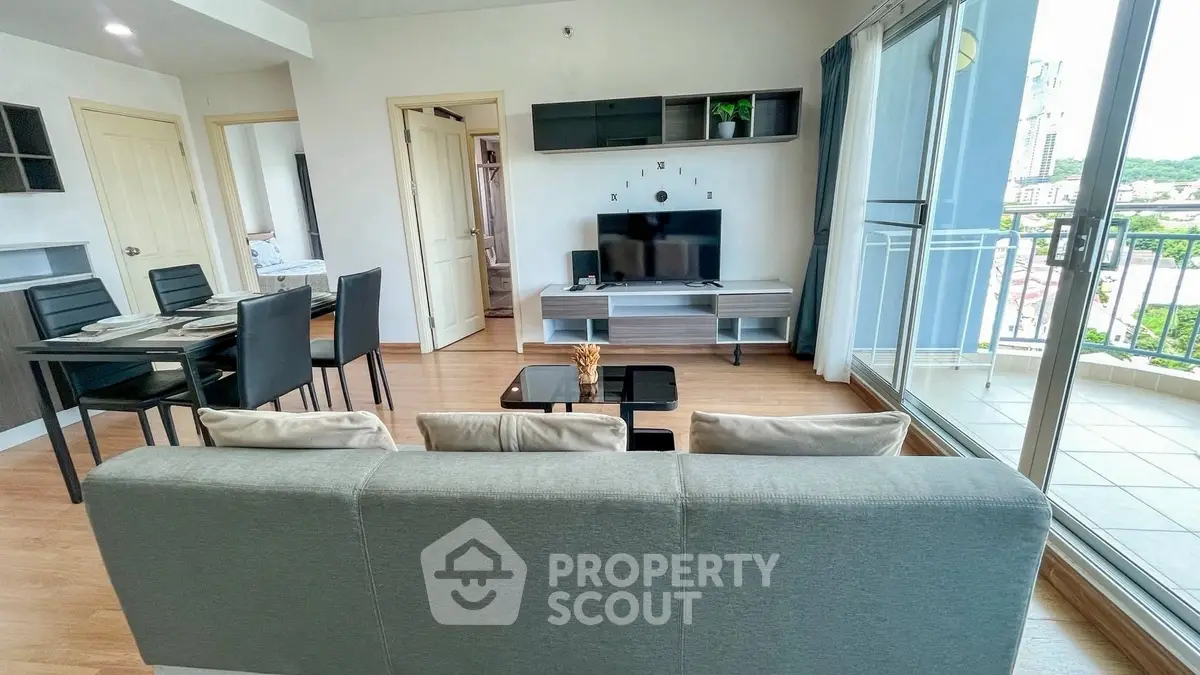 Modern living room with balcony view in stylish apartment