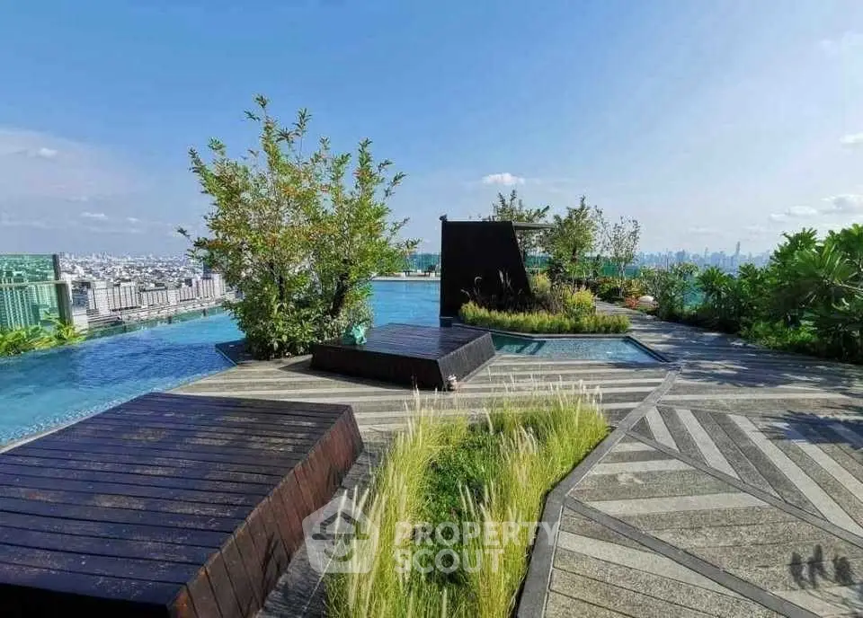 Luxurious rooftop pool with stunning city views and lush greenery