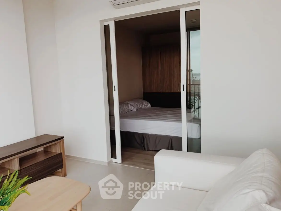 Modern apartment with cozy bedroom and stylish living area