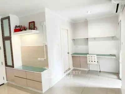 Modern study room with built-in desk and storage in bright minimalist design