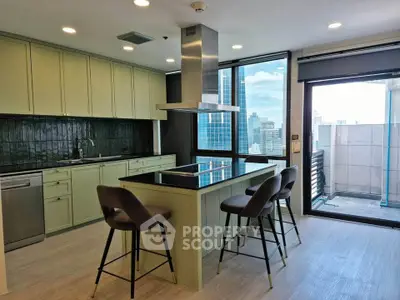 Modern kitchen with island and city view, featuring sleek cabinetry and stylish bar stools.