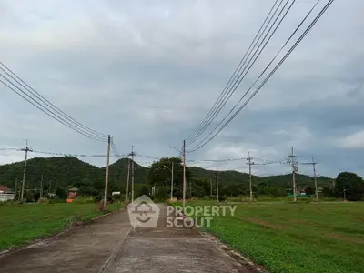 Expansive land plot with scenic mountain views, ideal for development or investment opportunities.